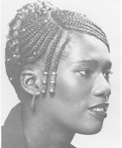 Natural Hairstyle cornrows by Riqui