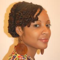 African American woman with natural hairstyle in zig zags
