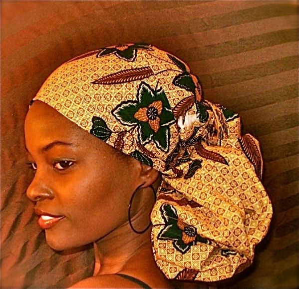 Headwraps are not just a quick fix for a bad hair day. Colorful scarfs intricately wrapped around.