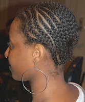 natural hair cornrowed for a weave